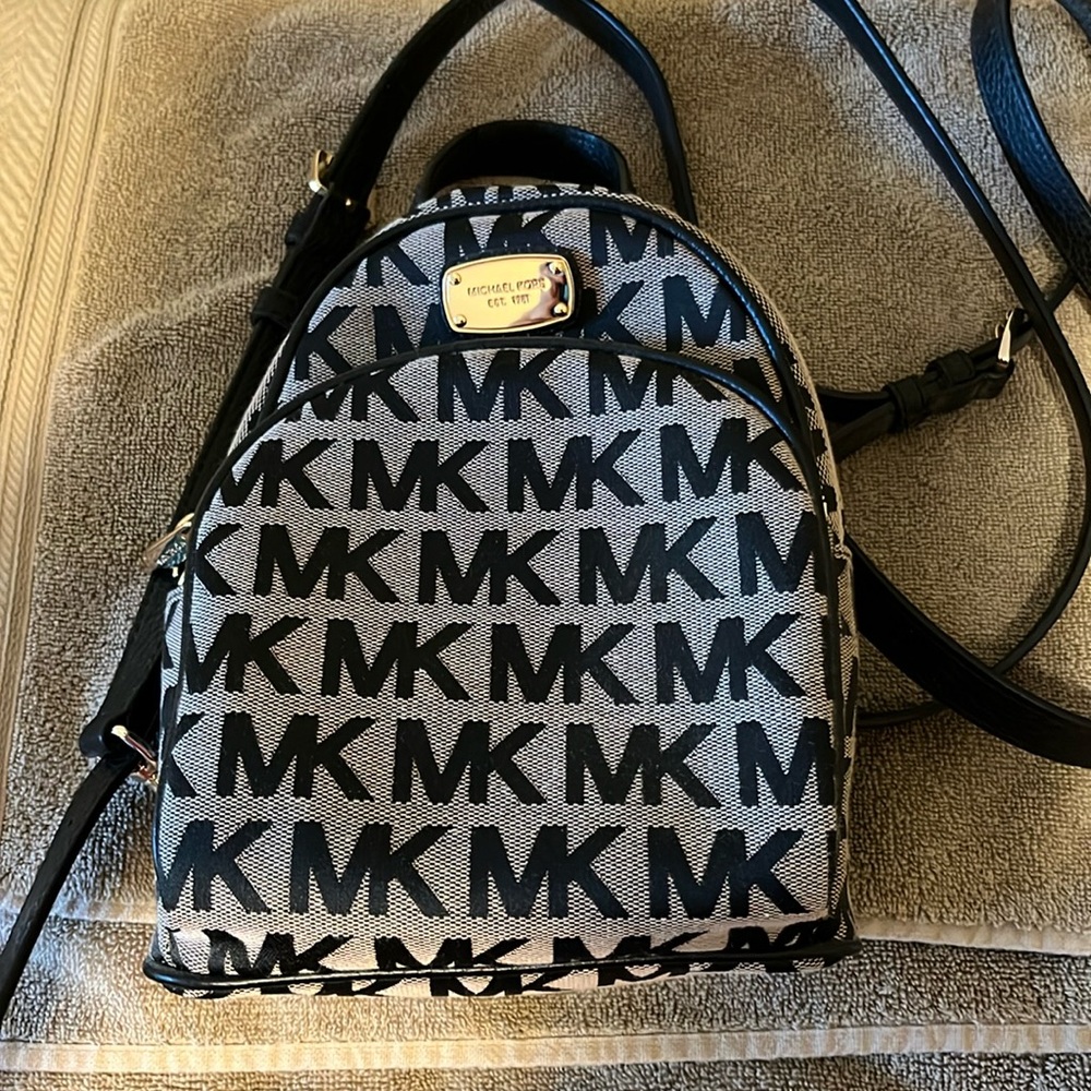 Michael Kors XS Abbey Backpack black and tan leather adjustable straps unused